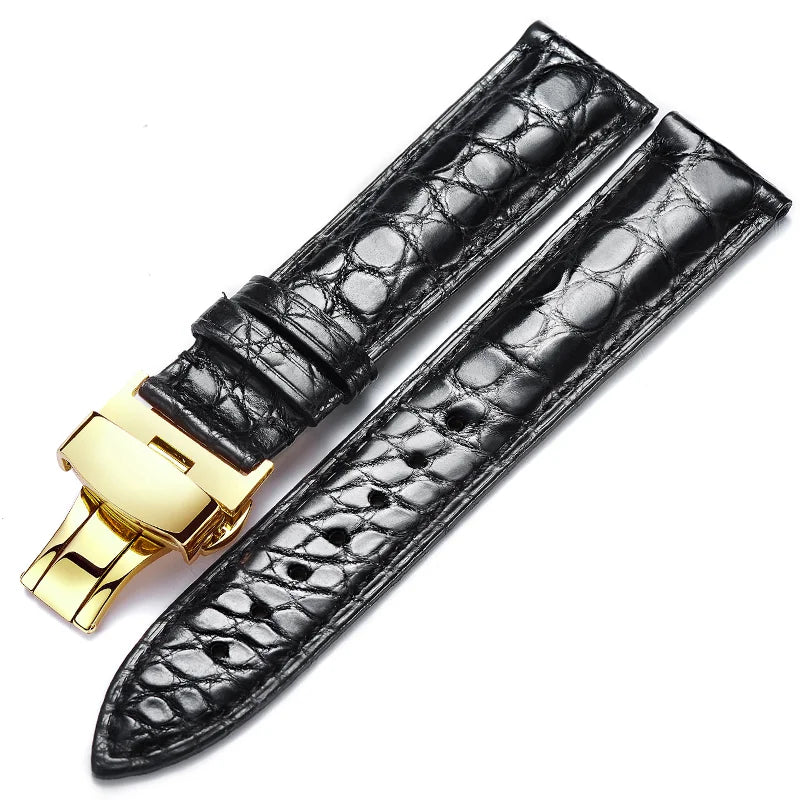 Black alligator‑textured leather strap with gold butterfly clasp, offering elegant watch customization across 12–24 mm widths.