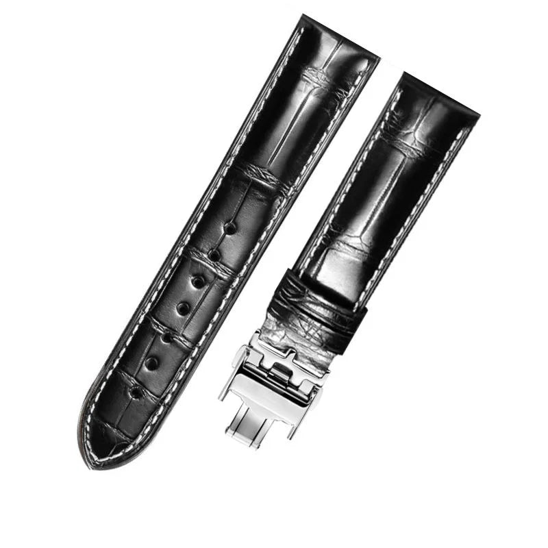 WatchesMate black alligator-textured leather strap for Longines with silver deployant clasp.