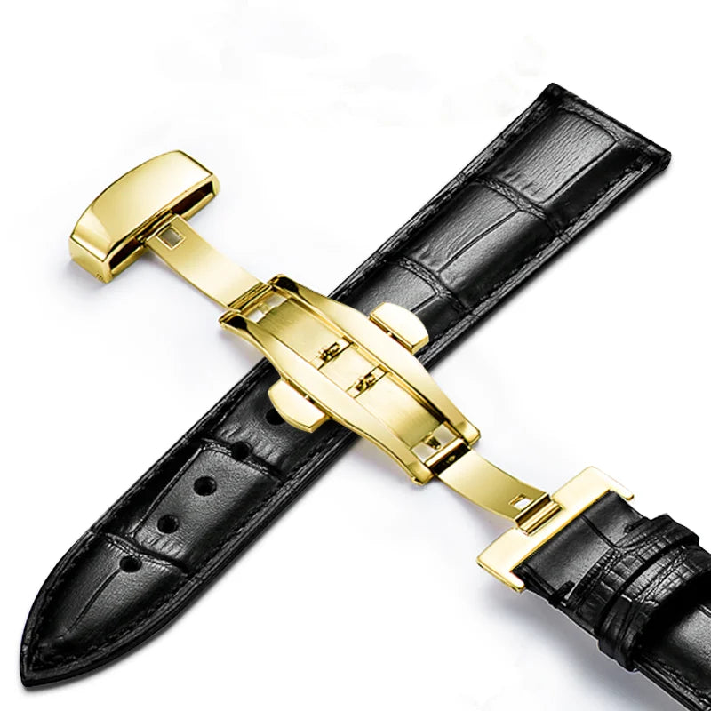 Black calfskin watch strap featuring a gold butterfly clasp.