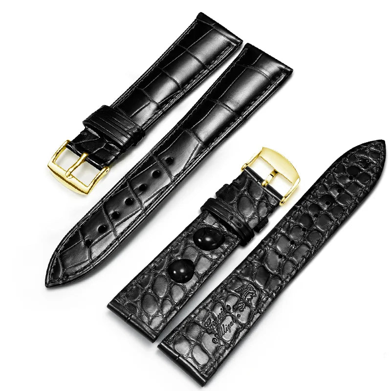 Black dual-sided alligator-textured leather strap with gold pin buckle.