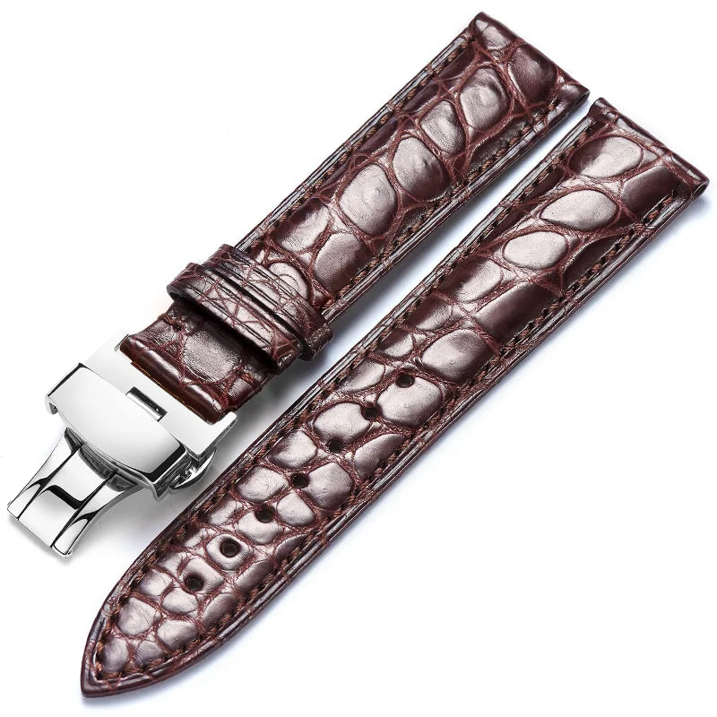 Brown alligator‑textured leather strap for multiple brands, fitted with a silver butterfly clasp for secure fit.