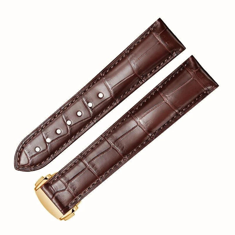 Brown alligator-textured leather strap for Omega with gold deployant clasp, hand‑stitched for both elegance and durability.