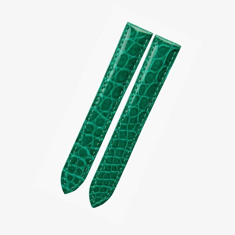 Green alligator-textured leather watch strap by WatchesMate, compatible with Cartier Tank and similar watches