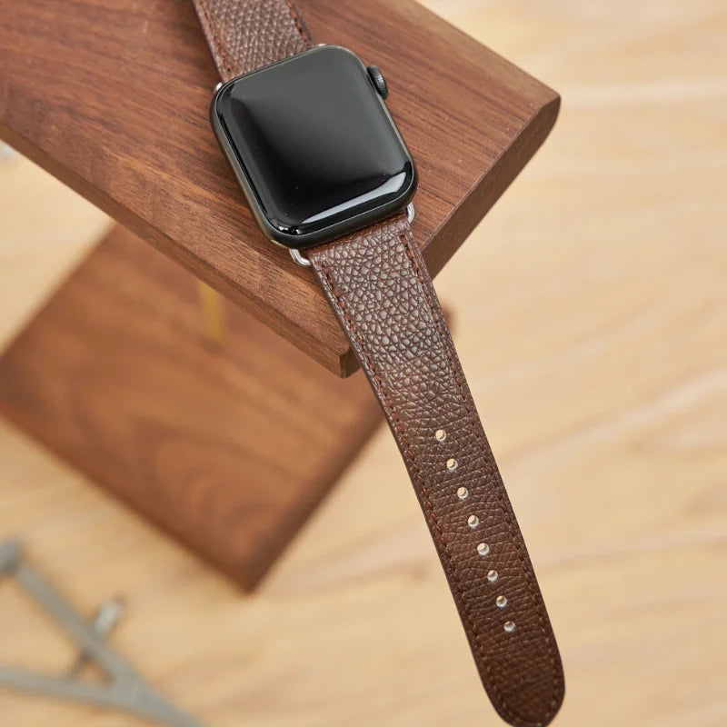 WatchesMate handcrafted caramel Epsom leather strap with hand-finished edges, compatible with Apple Watch.