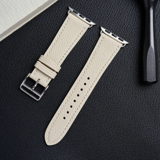 WatchesMate elegant white Epsom leather watch band with precision adapters, compatible with Apple Watch.
