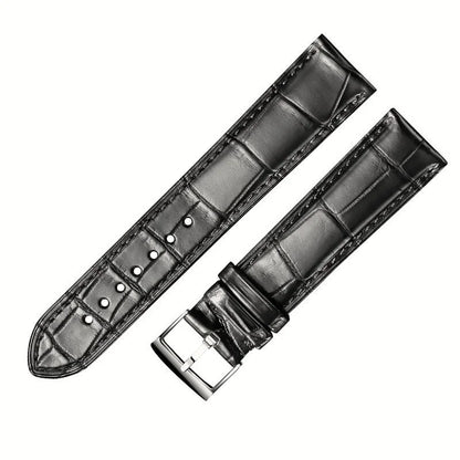Black alligator-textured leather watch strap with silver pin buckle by WatchesMate, compatible with multiple watch models