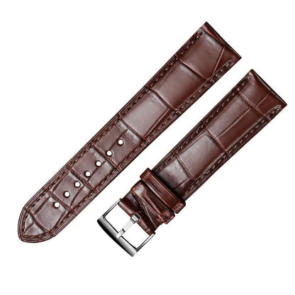 Brown alligator-textured leather watch strap with silver pin buckle by WatchesMate, compatible with multiple watch models