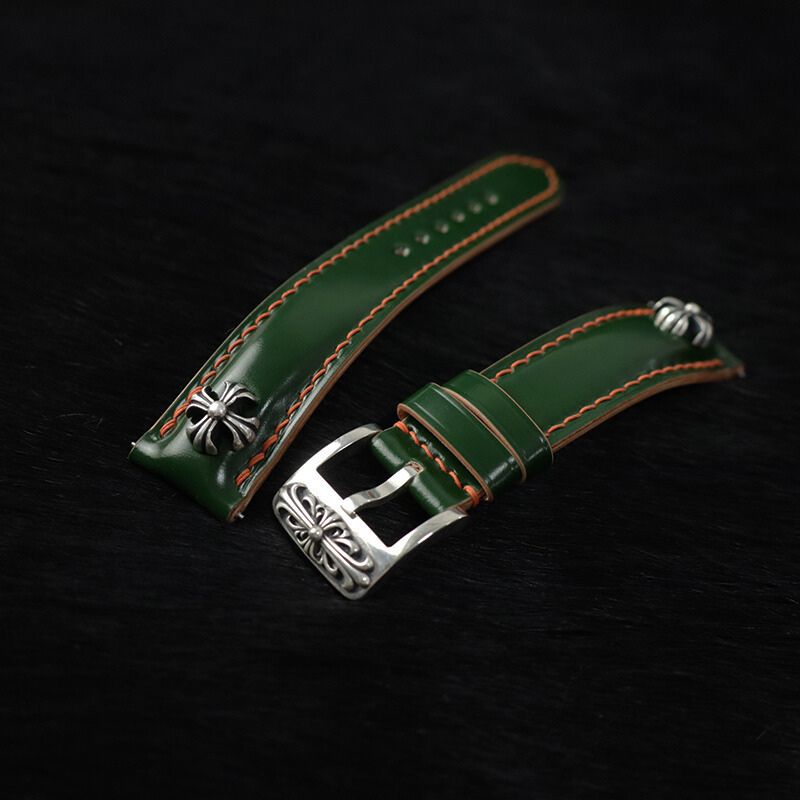 Handcrafted green Japanese Shell Cordovan watch strap featuring cross-stud details and 925 sterling silver accents, designed for premium watches
