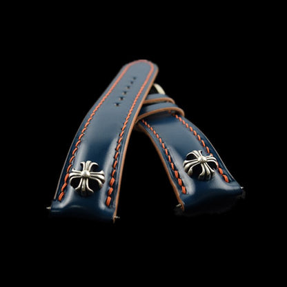 Handcrafted Japanese Shell Cordovan leather watch strap featuring cross studs and sterling silver accents, designed for premium watches