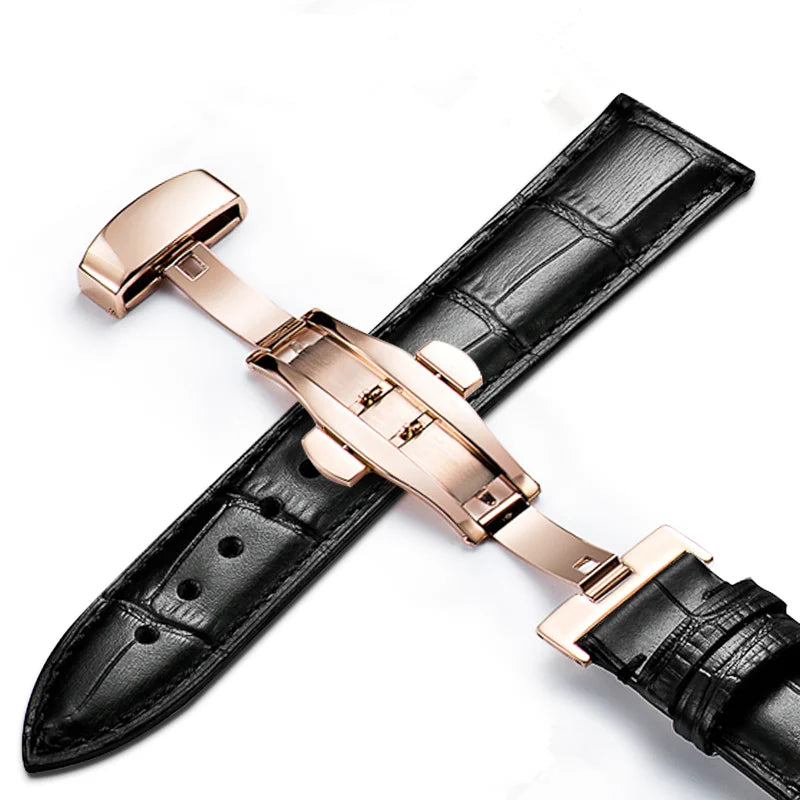 Black calfskin watch strap featuring a rose gold butterfly clasp.