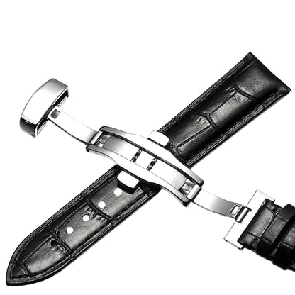Black calfskin leather strap with silver butterfly clasp, crafted for refined everyday wear