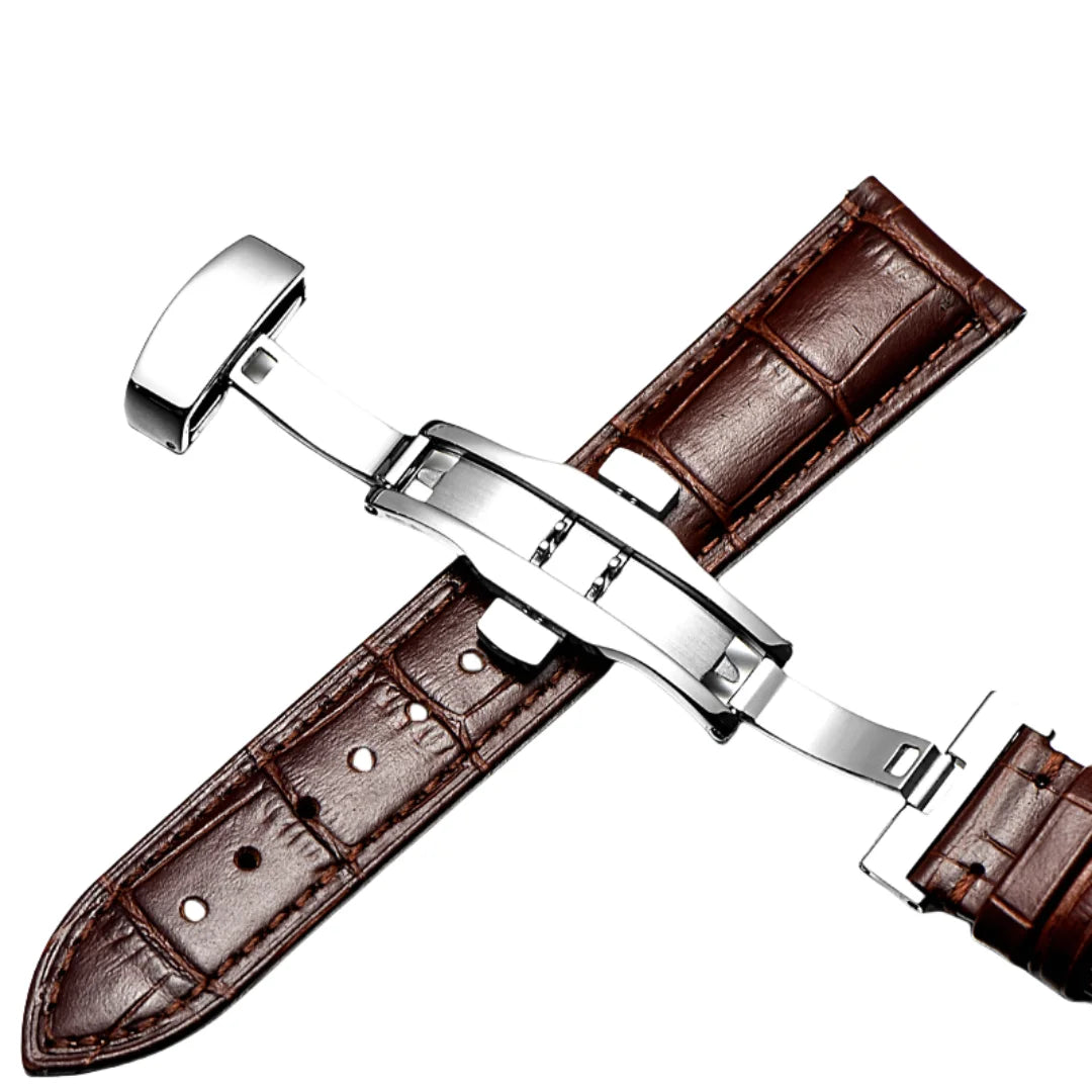 Brown calfskin watch strap featuring a silver butterfly clasp.