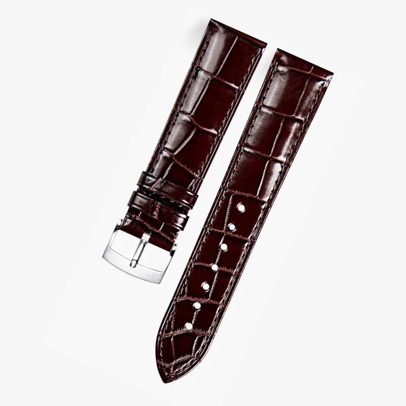 Rich brown alligator-pattern leather strap compatible with Omega watches, featuring a stainless-steel buckle—elegant, durable, and ideal for formal occasions