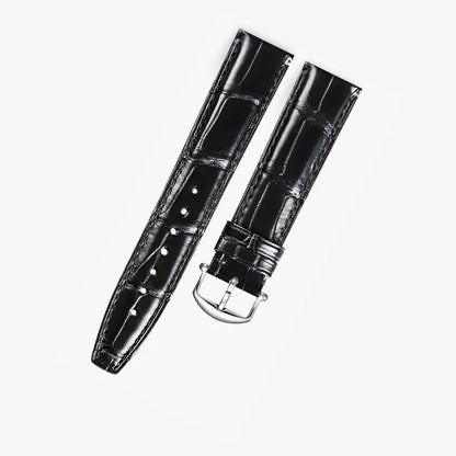Black alligator-textured leather strap with silver pin buckle, handcrafted by WatchesMate. Compatible with IWC models, offering a refined and luxurious look