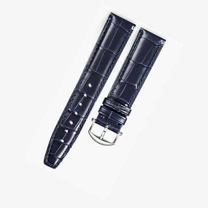 Dark blue alligator-textured leather strap with silver pin buckle, compatible with IWC watch models (20mm–22mm). Sleek design and premium craftsmanship by WatchesMate
