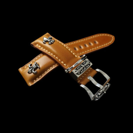 Handcrafted watch strap in bold orange Shell Cordovan, featuring 925 silver iris ornament and Gothic-punk 3D relief