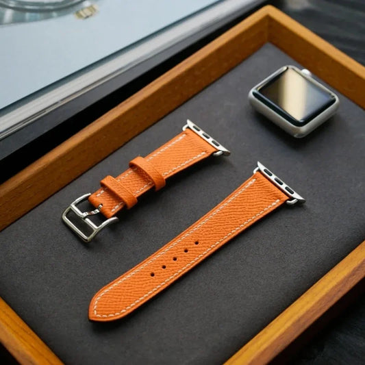 WatchesMate handcrafted vibrant orange Epsom leather watch strap, compatible with Apple Watch Ultra and Series 10.